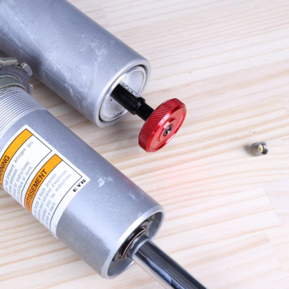 UTIL EXTRACTOR TAPON SUSPENSION TRASERA