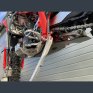 Cubrecárter Enduro con protector de escape y bieletas X-Trainer 250/300 2025